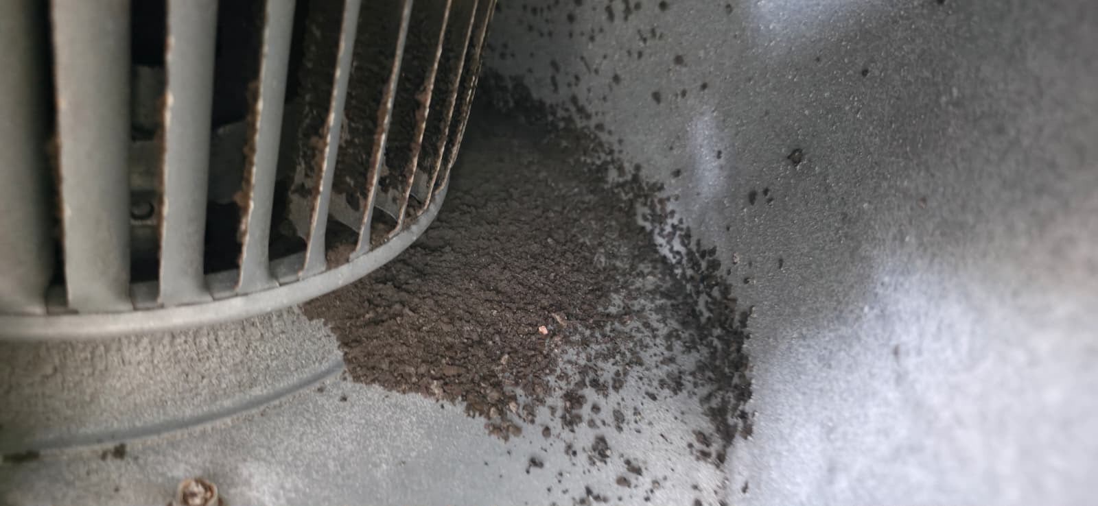 Dirty air duct vent grill covered in dust and debris before professional duct cleaning in Hillsborough County FL